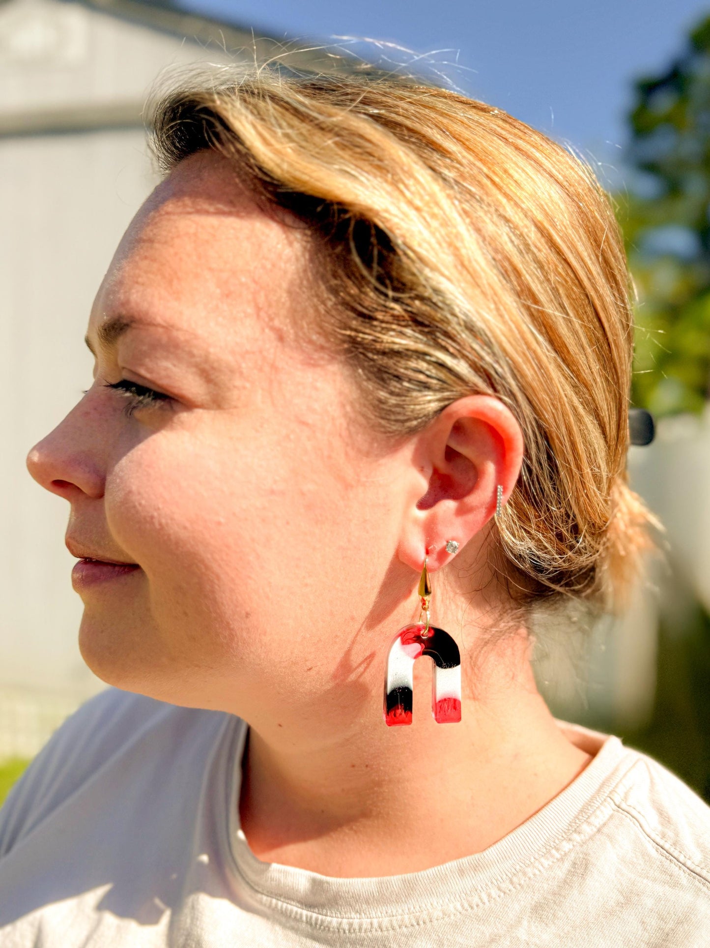 Handcrafted Resin Arch Earrings: Pink Black Swirl with Gold Hooks