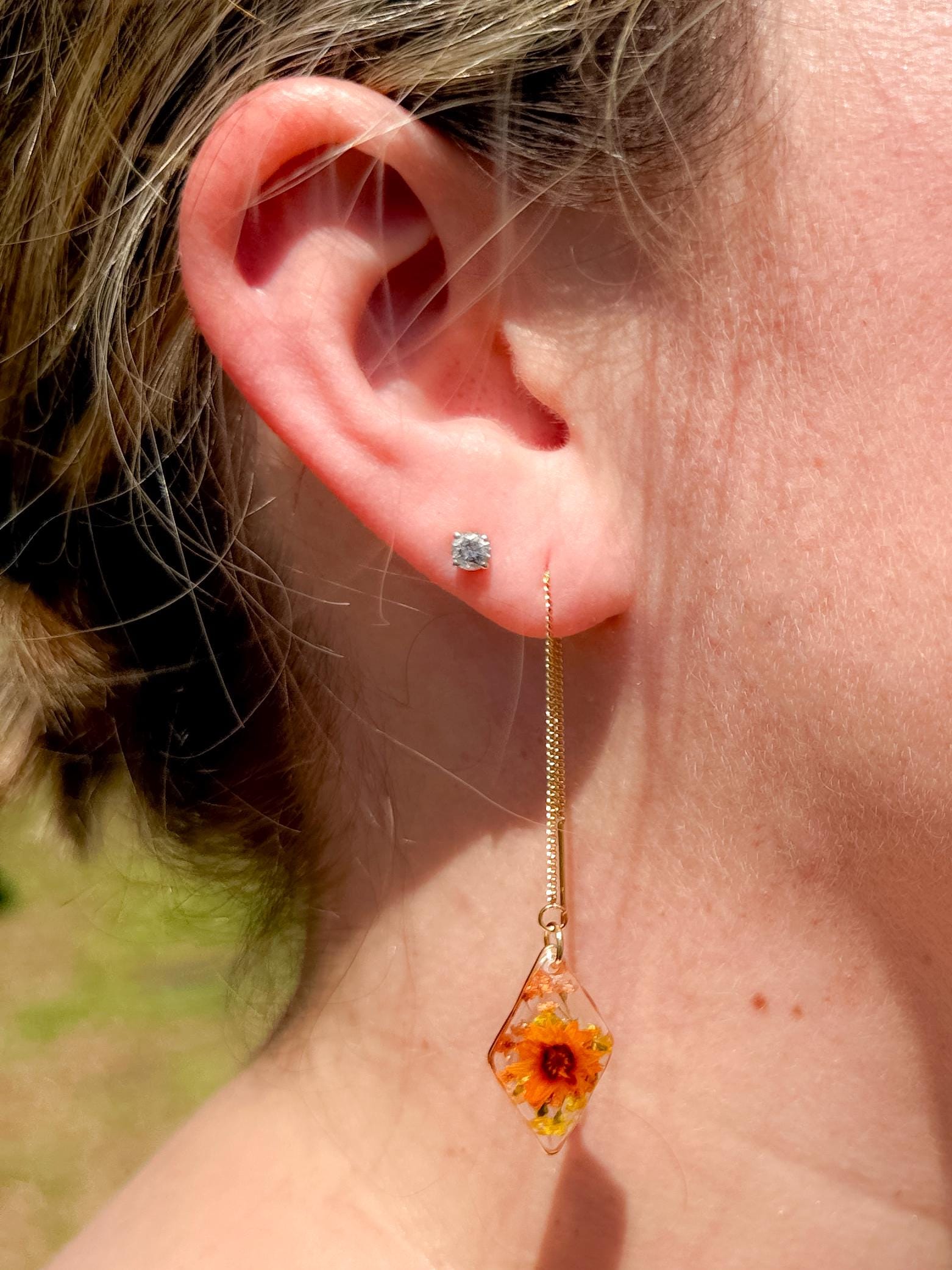 Dual Tone Floral Earrings – Clear Resin, Yellow & Orange Blooms with Foliage