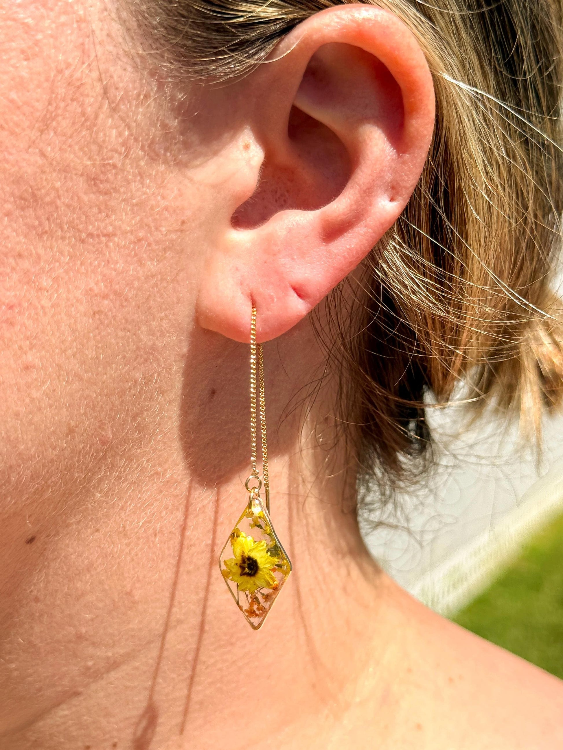Dual Tone Floral Earrings – Clear Resin, Yellow & Orange Blooms with Foliage