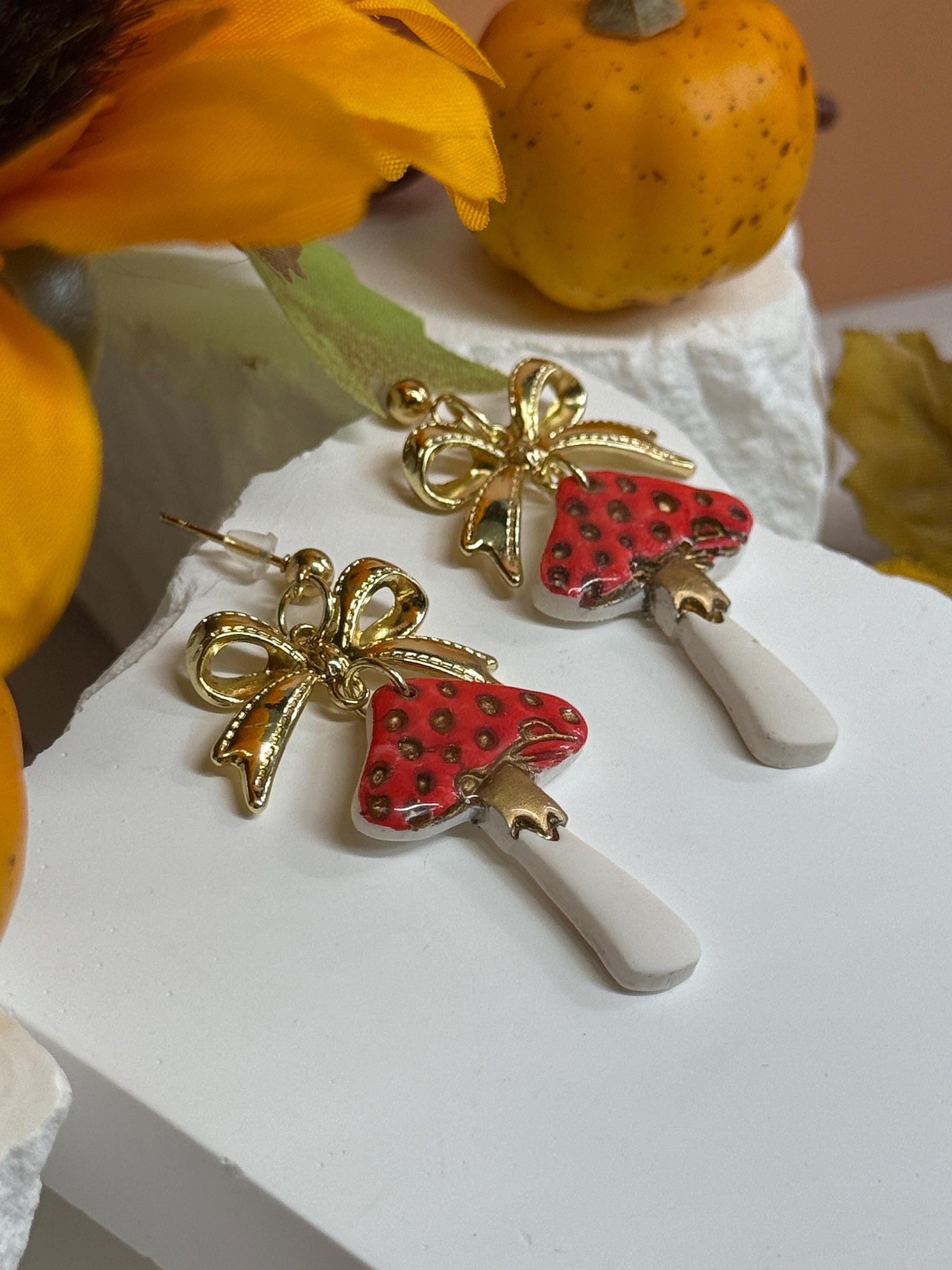 Mushroom Earrings, Whimsical Earrings — Red Toadstool Dangles with Gold Bows | Clay & Resin Fall Jewelry